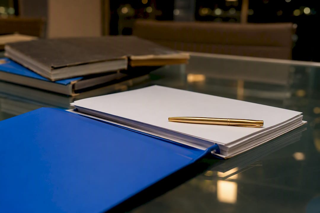 Open folders with audit compliance documents